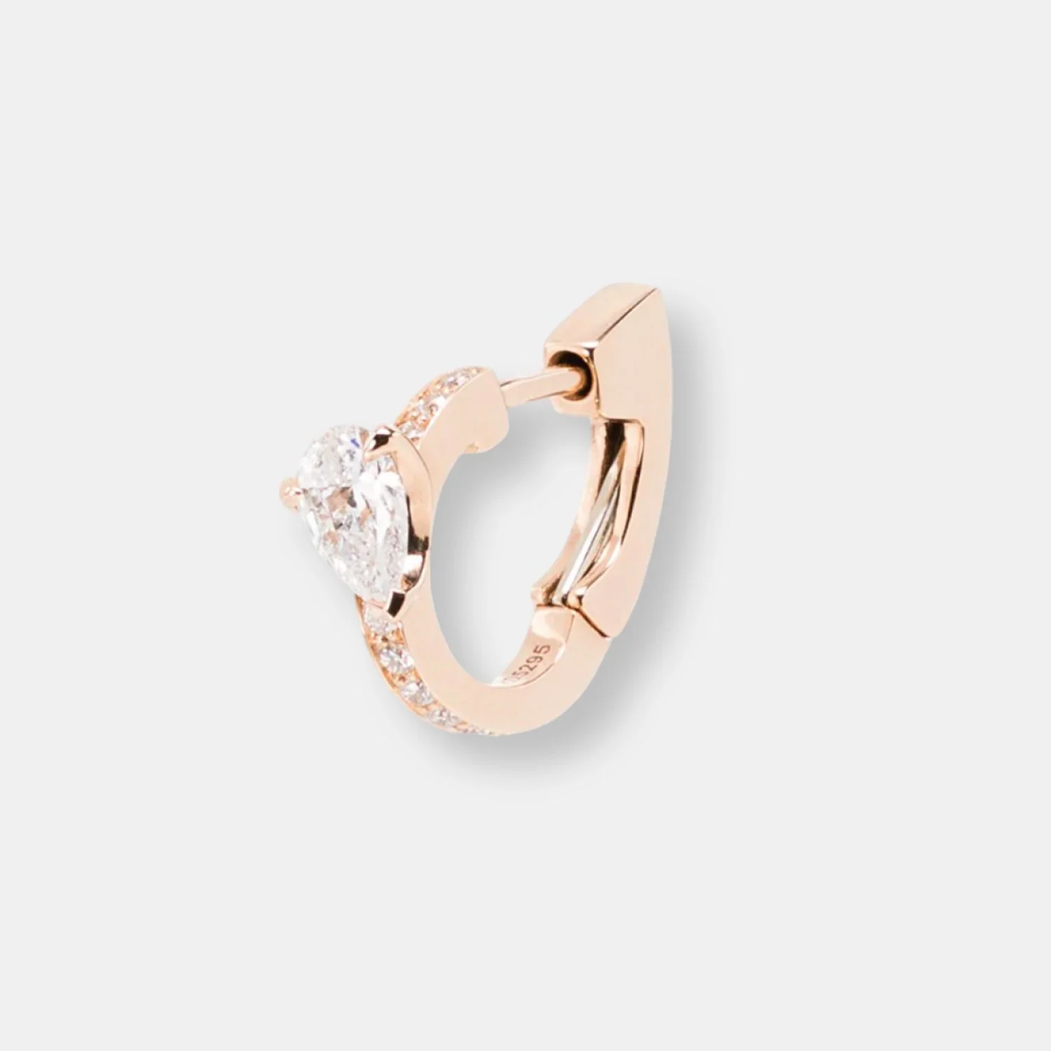 Boucle d'oreille serti sur vide en or rose